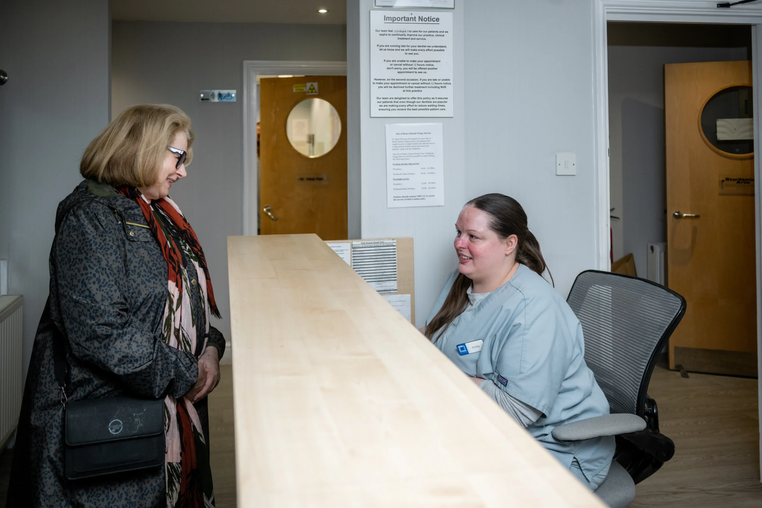 Patient at reception checking in